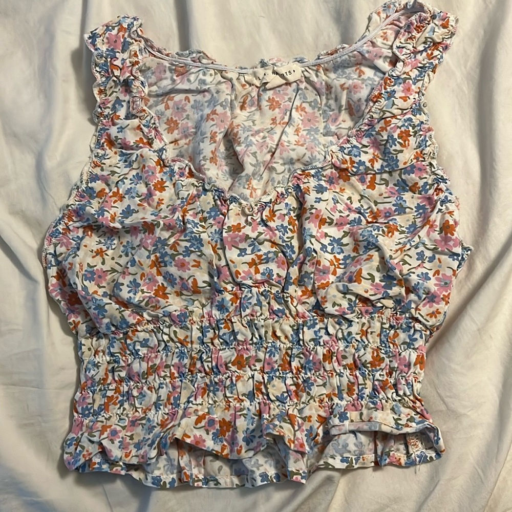 LA hearts floral tank top. Only work once. In great condition.